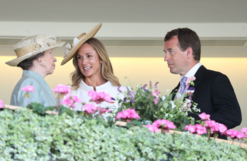 Anne, Princess Royal speaks with Harriet Sperling and Peter Phillips  at Royal Ascot