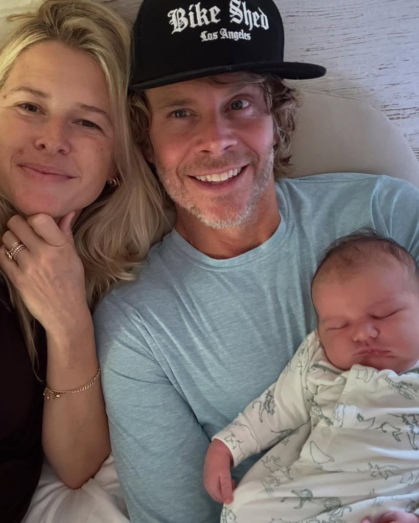 Sarah Wright Olsen and Eric Christian Olsen holds their newborn baby girl, Ocean Rain Olsen, in a photo shared on Instagram