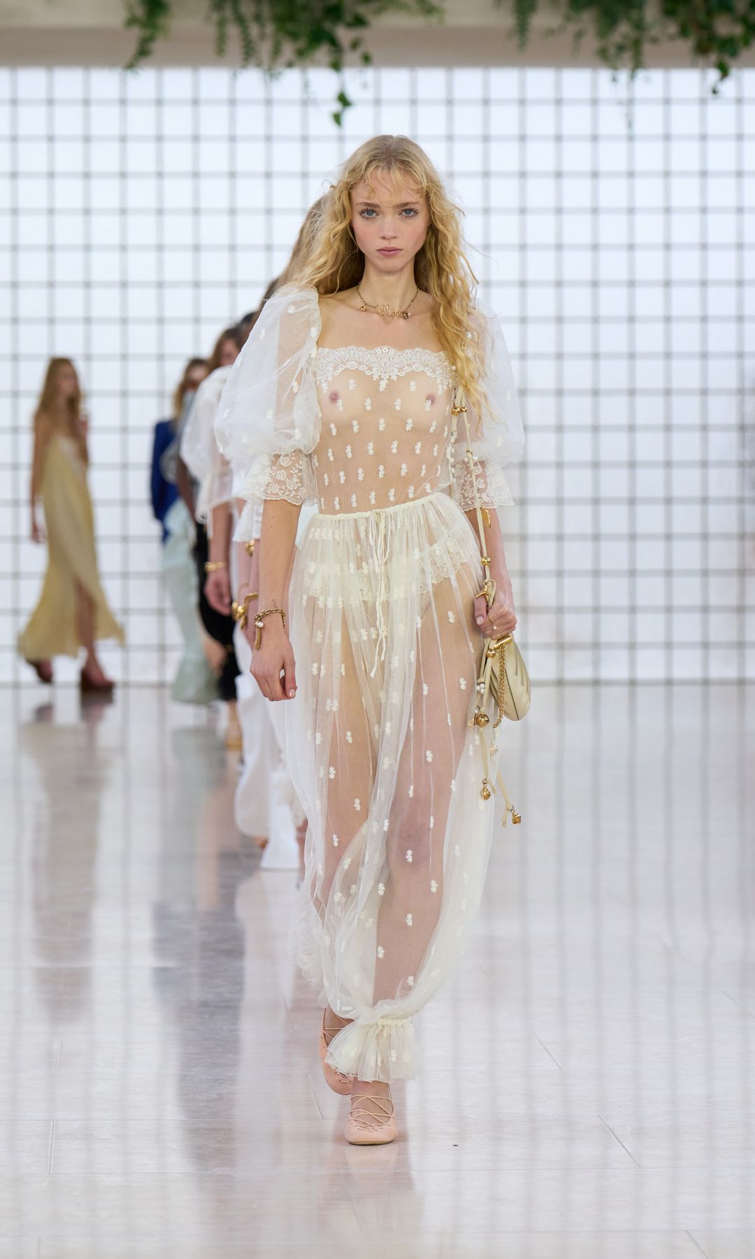 A model wears a set of sheer Chloé bloomers on the runway