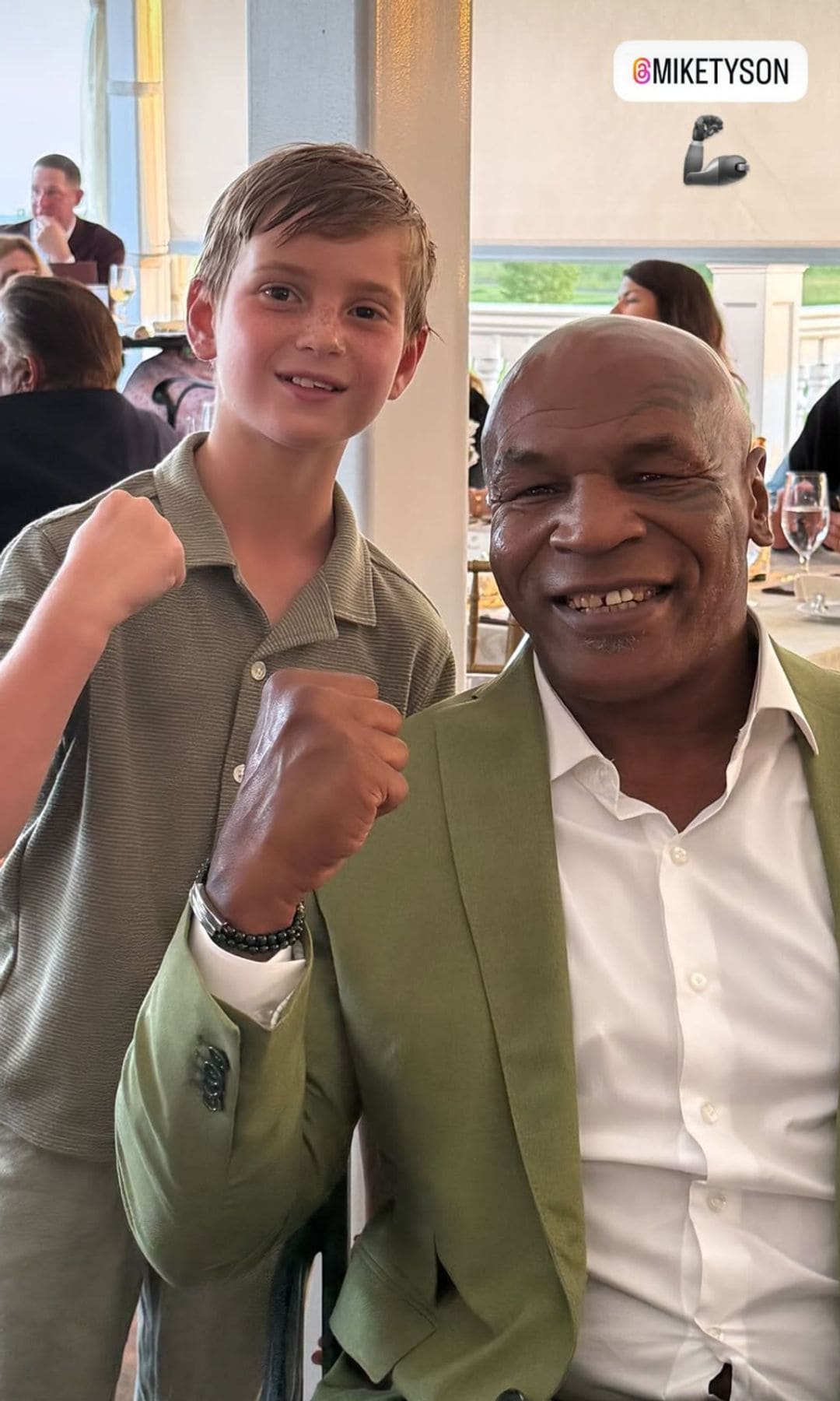 Theo took a photo alongside boxing legend Mike Tyson