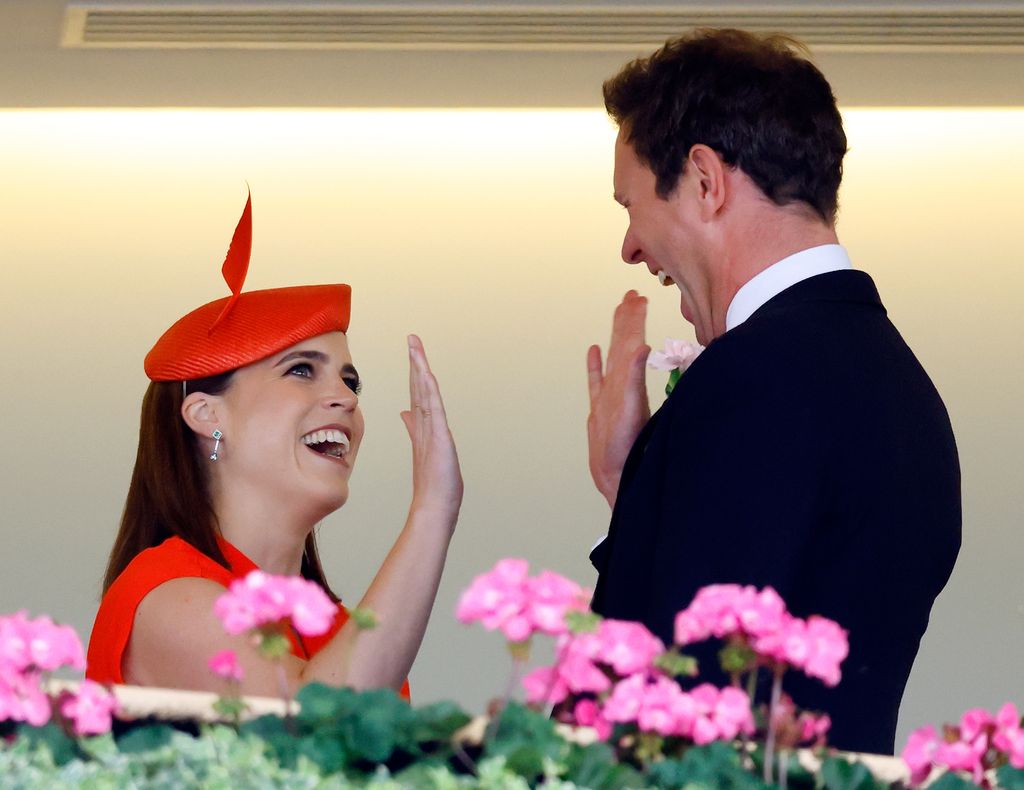 Princess Eugenie and Jack Brooksbank celebrate as they watch the racing on day 5 of Royal Ascot 