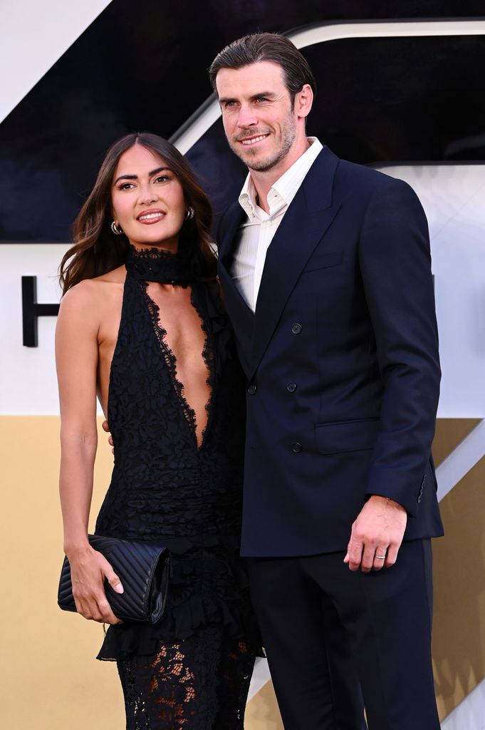 gareth bale and emma rhys-jones at f1 the movie premiere