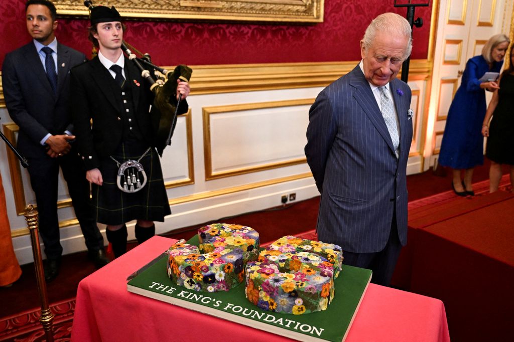 Britain's King Charles III reacts as he attend the King's Foundation Awards ceremony, on the 35th anniversary of The King's Foundation, at St James's Palace, in London, on June 12, 2025