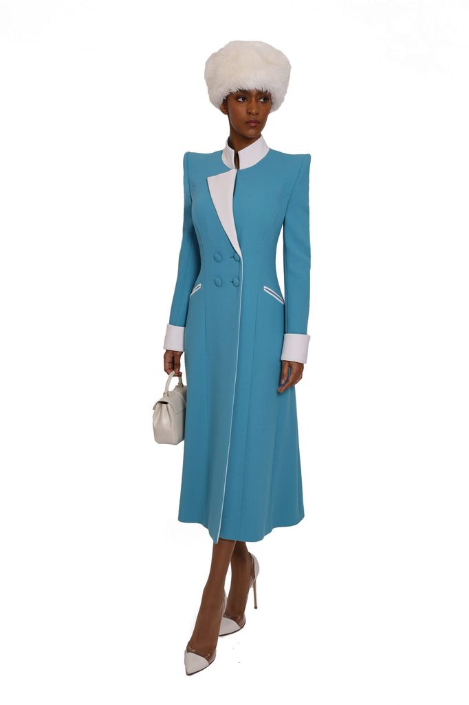 Kate wore this stunning blue coat dress by Catherine Walker