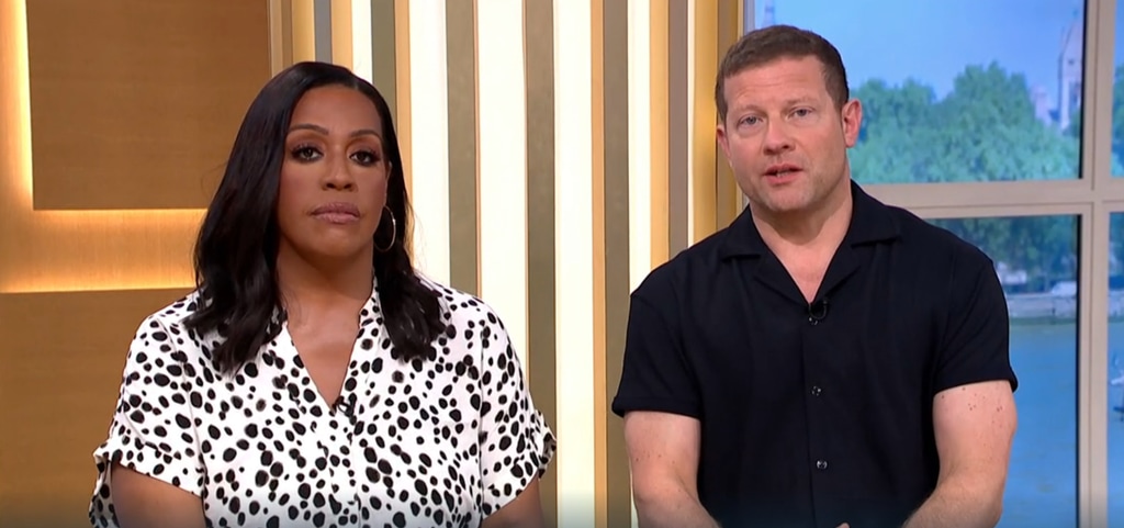 Female and male TV presenters in studio