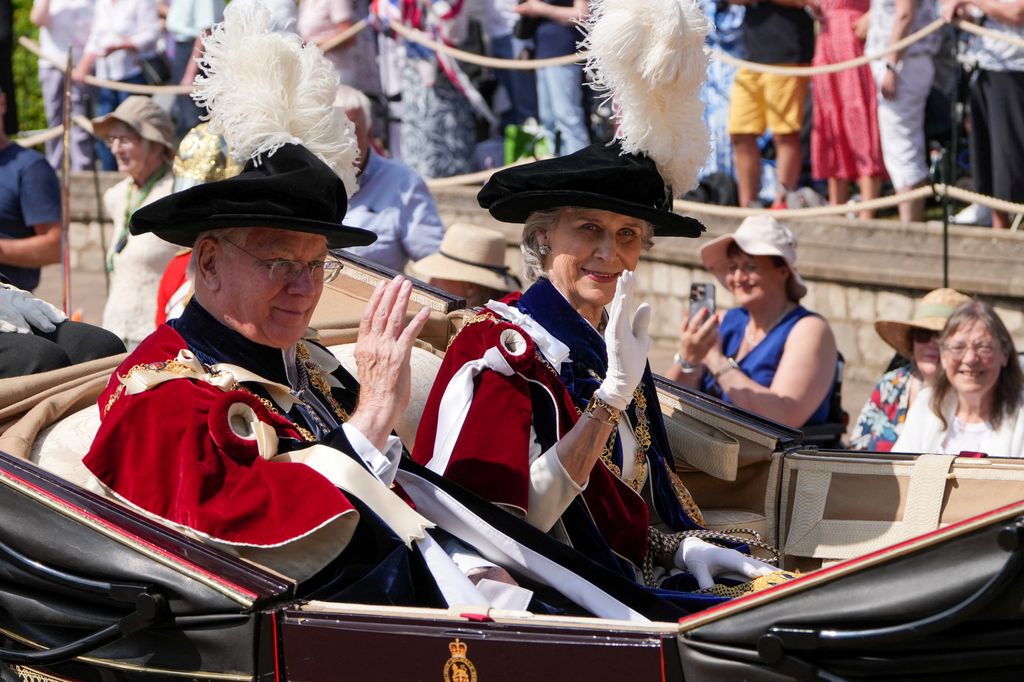 Prince Richard, Duke of Gloucester and Birgitte, Duchess of Gloucester ride in a carriage after the Order of the Garter service