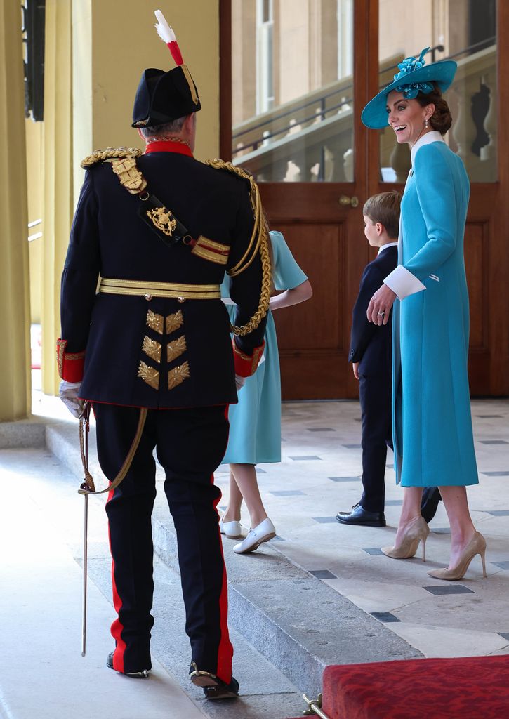 Kate's blue coat dress looked enchanting with her hat by Juliette Botterill