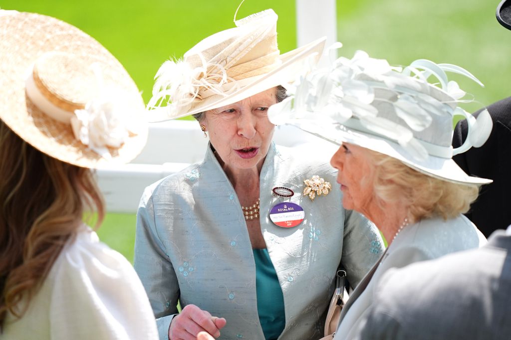 Princess Anne speaks with Queen Camilla during day one of Royal Ascot