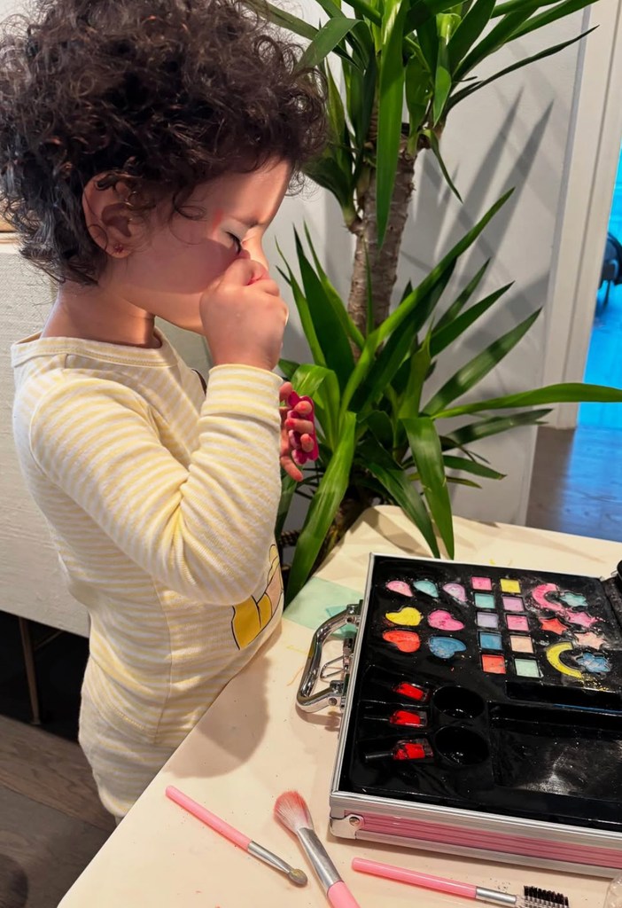 Photo shared by Priyanka Chopra of her daughter Malti trying on make up