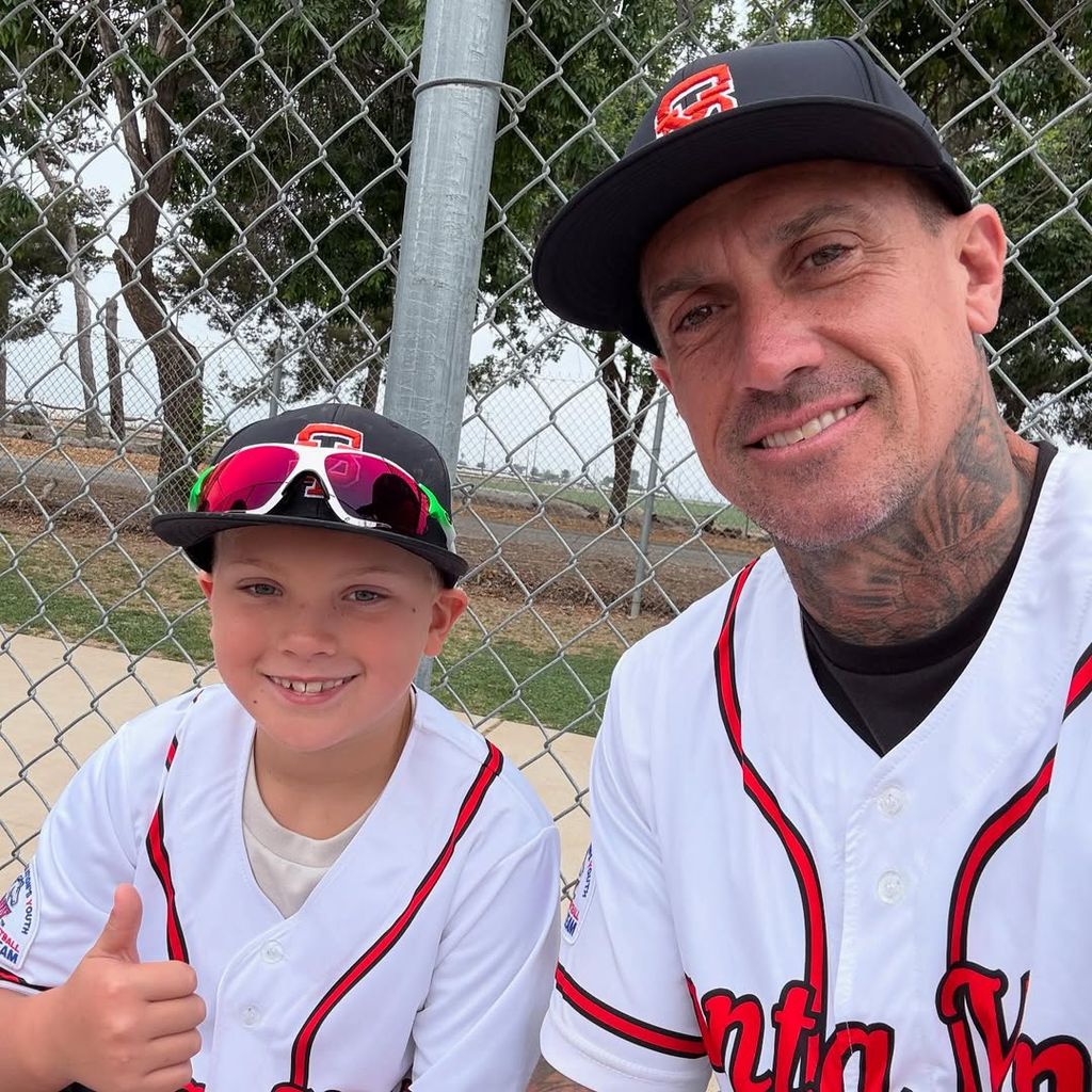 Carey Hart and his son Jameson pose for a selfie at a baseball game, shared on Instagram