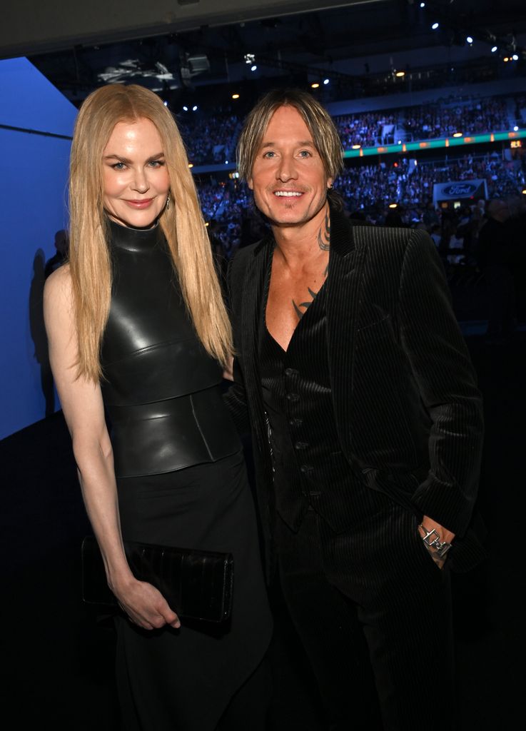 keith urban and nicole kidman wearing black inside ford center texas