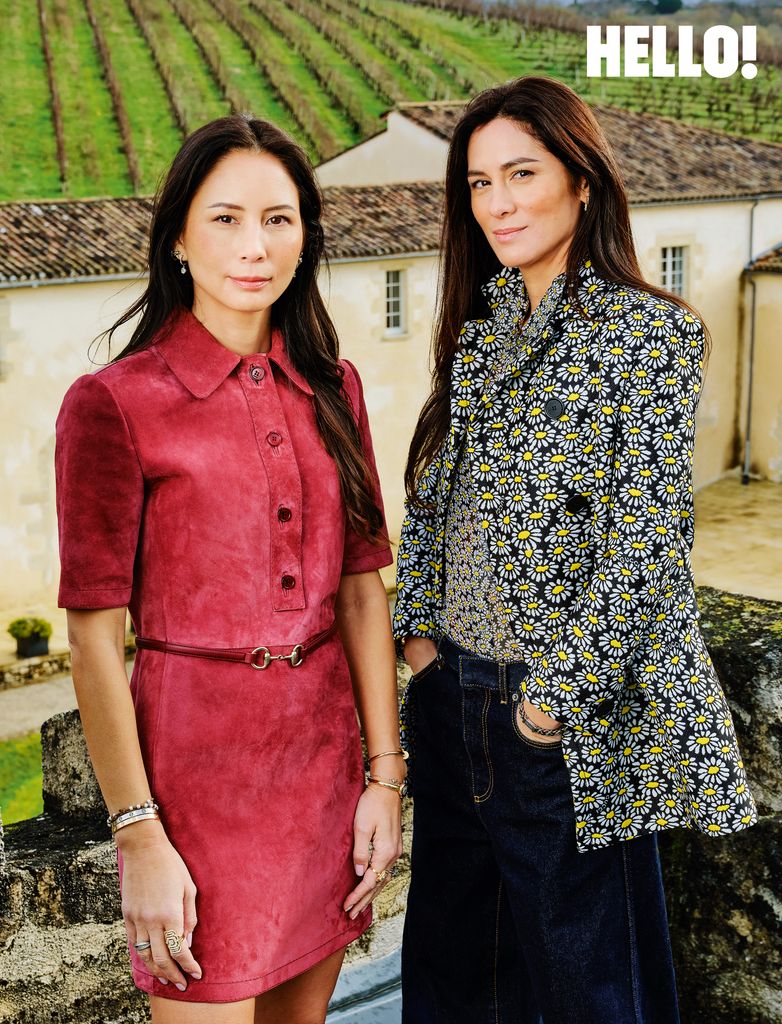 The Huynh sisters standing next to eachother in the vineyard outside Château Toulouse-Lautrec
