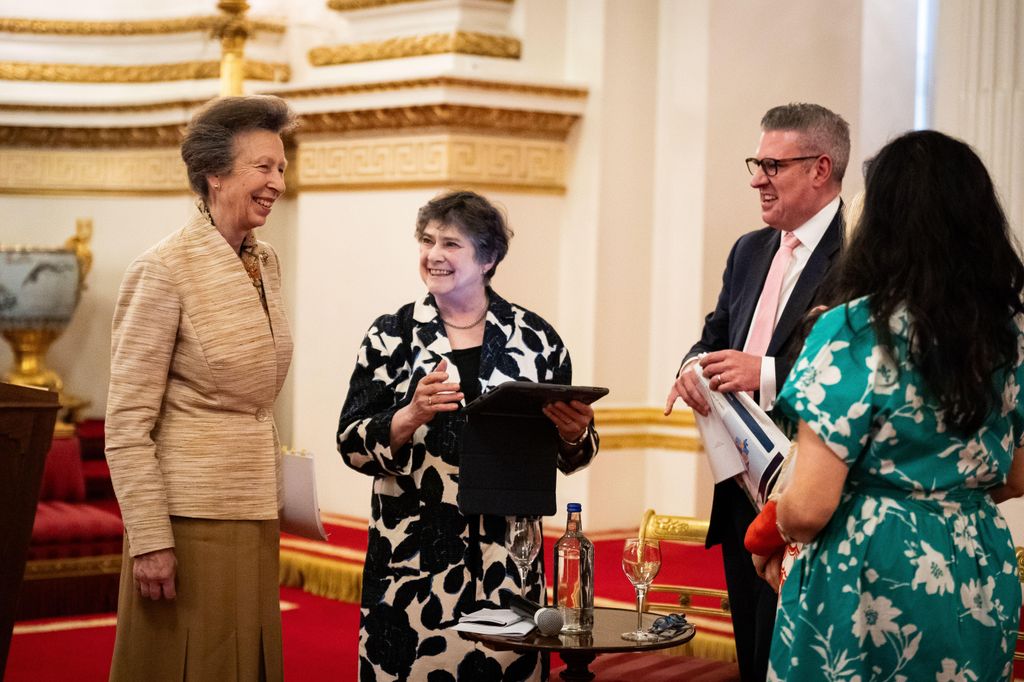 Princess Anne speaking with a group of people