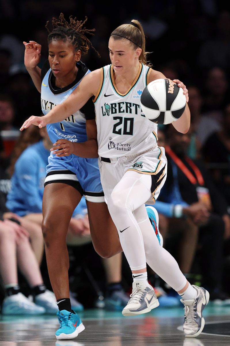 Sabrina Ionescu #20 of the New York Liberty dribbles against Ariel Atkins #7 of the Chicago Sky during the second half at Barclays Center on June 10, 2025 in the Brooklyn borough of New York City. The Liberty won 85-66. NOTE TO USER: User expressly acknowledges and agrees that, by downloading and or using this photograph, User is consenting to the terms and conditions of the Getty Images License Agreement. (Photo by Sarah Stier/Getty Images)