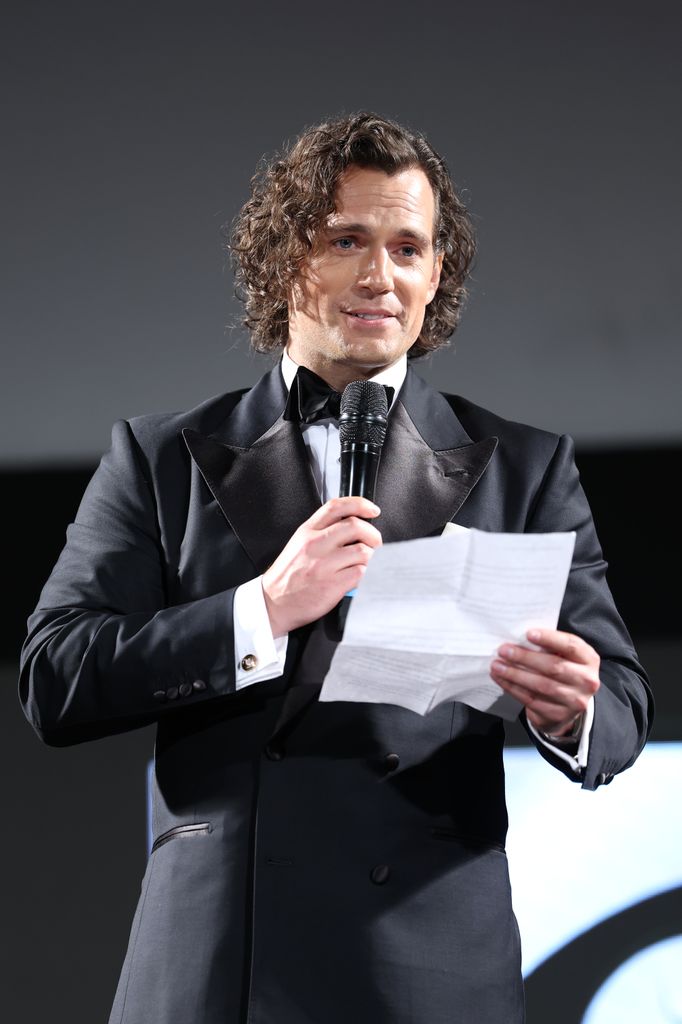 henry cavill with long curly hair