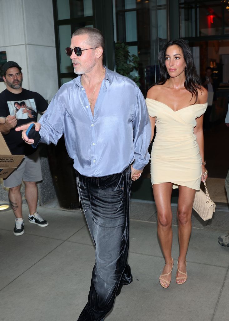 Brad Pitt and Ines de Ramon leaving restaurant hand in hand