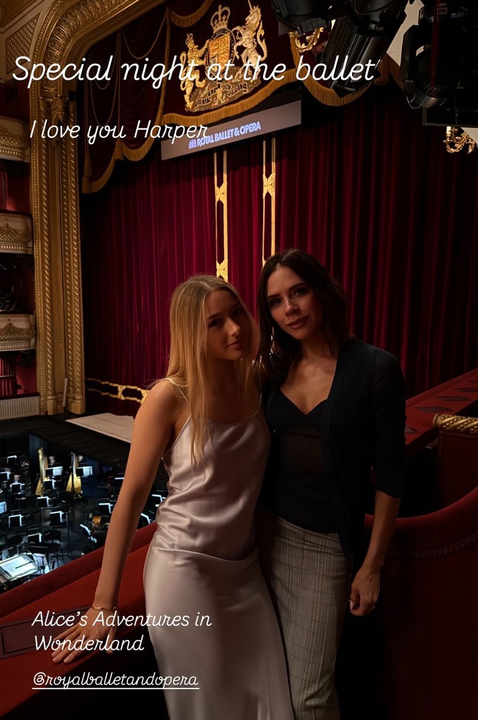 Harper and Victoria Beckham pose at the ballet