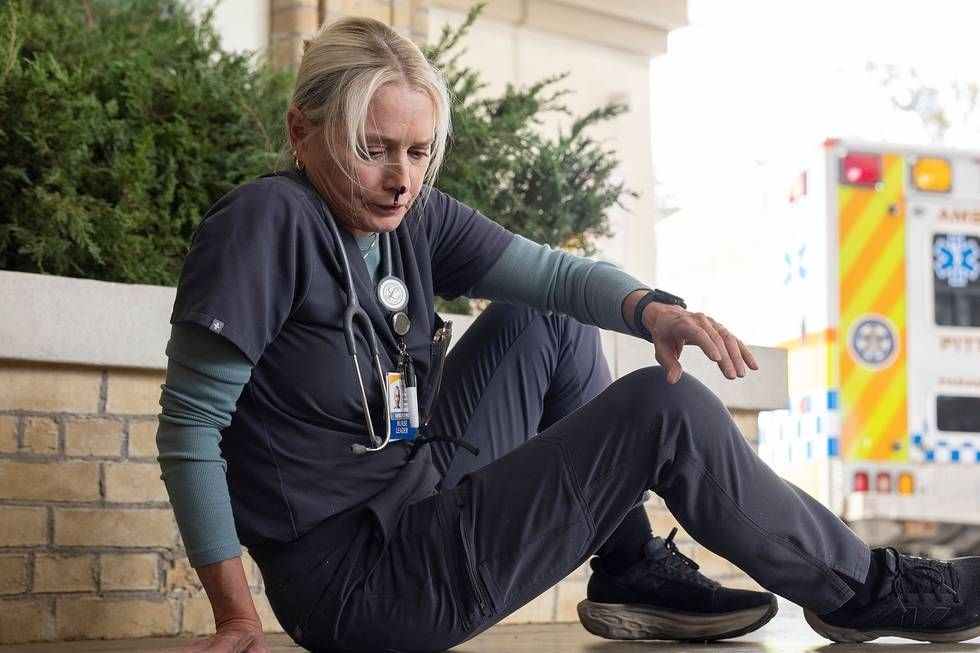 Katherine LaNasa as Dana Evans in The Pitt