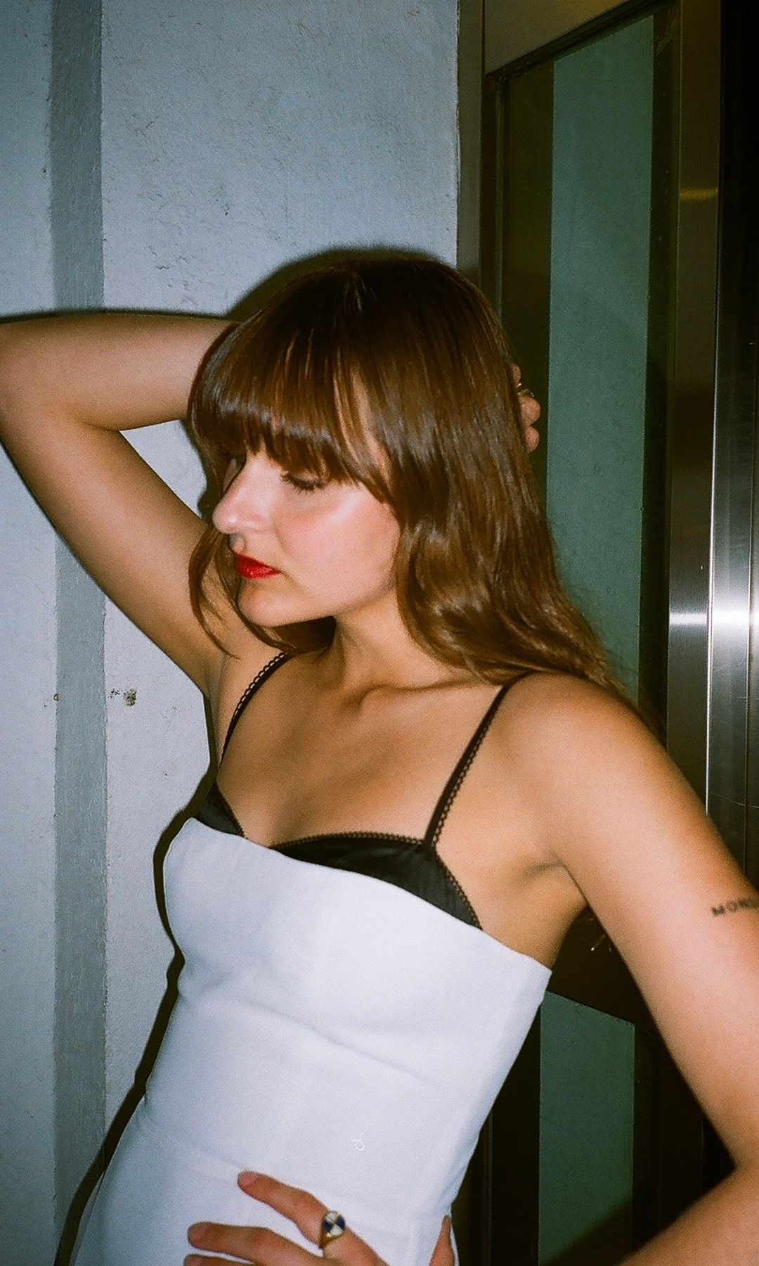 rosie viva wearing a white dress