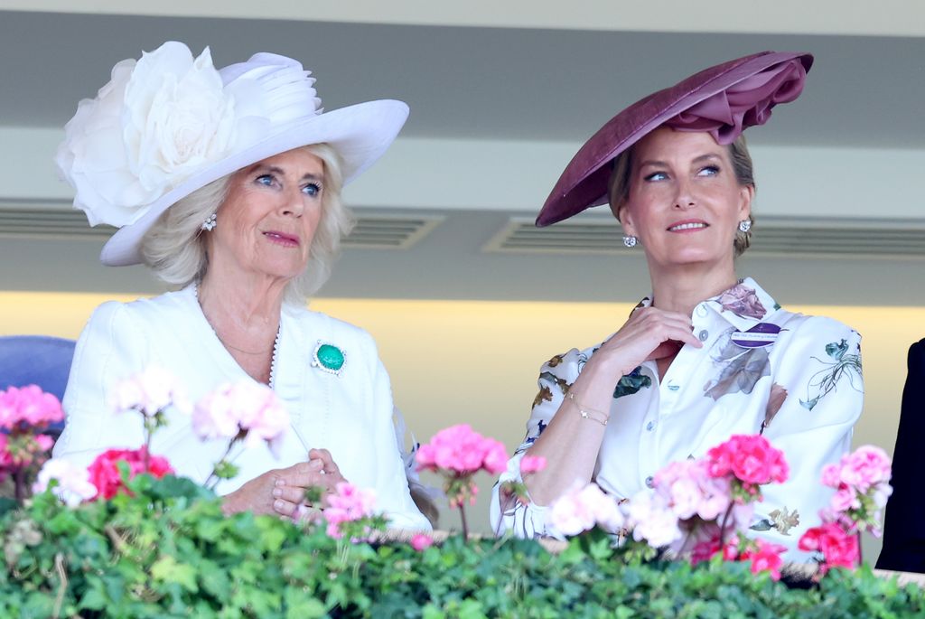 Queen Camilla and Sophie, Duchess of Edinburgh talk with each other as they attend day three of Royal Ascot 2024 