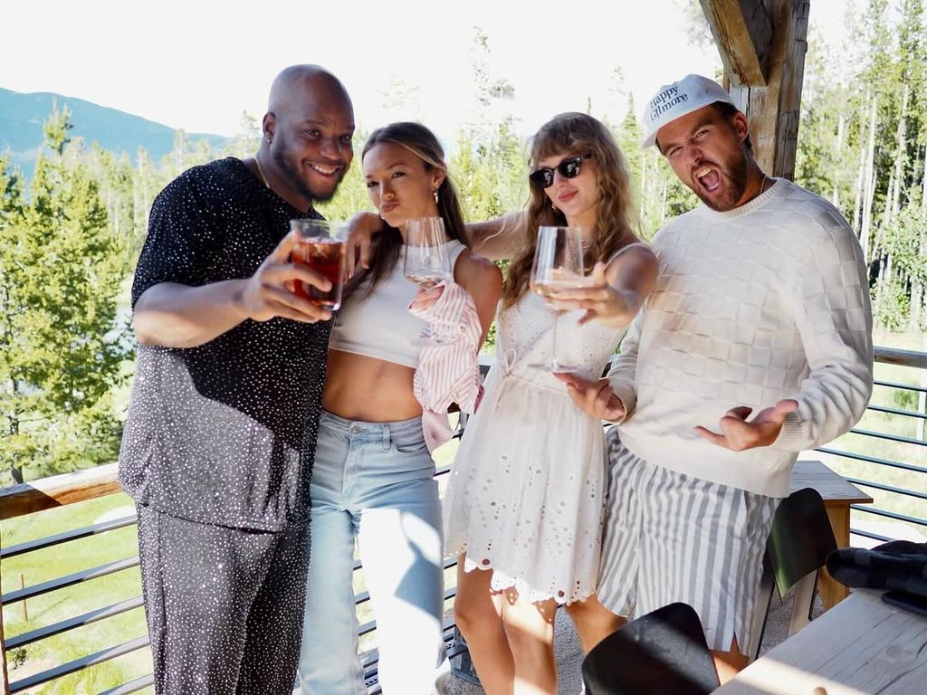 travis kelce taylor swift white dress