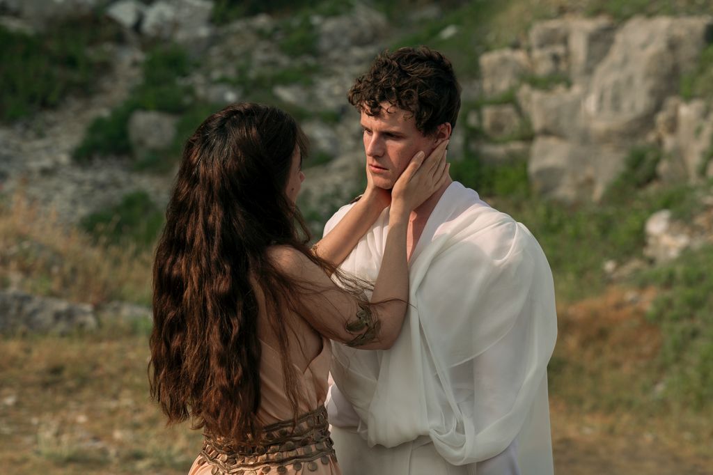 woman holding mans face 
