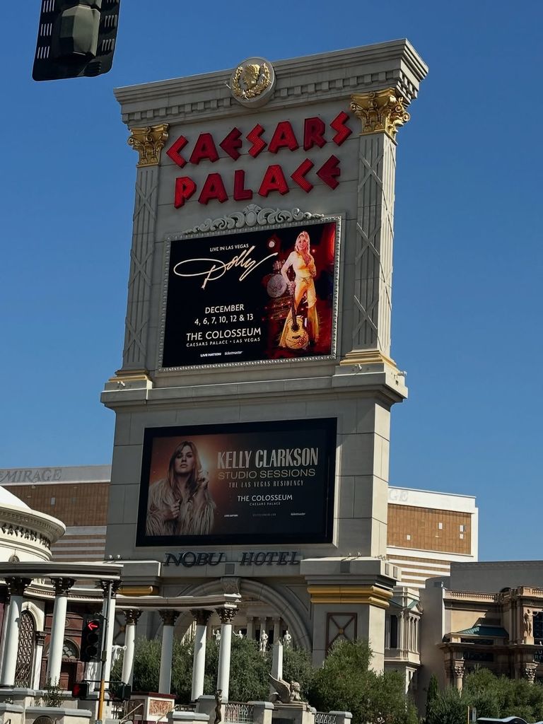 Kelly Clarkson shares a photo of hers and Dolly Parton's Las Vegas residency signs on display at Caesars Palace, shared on Instagram