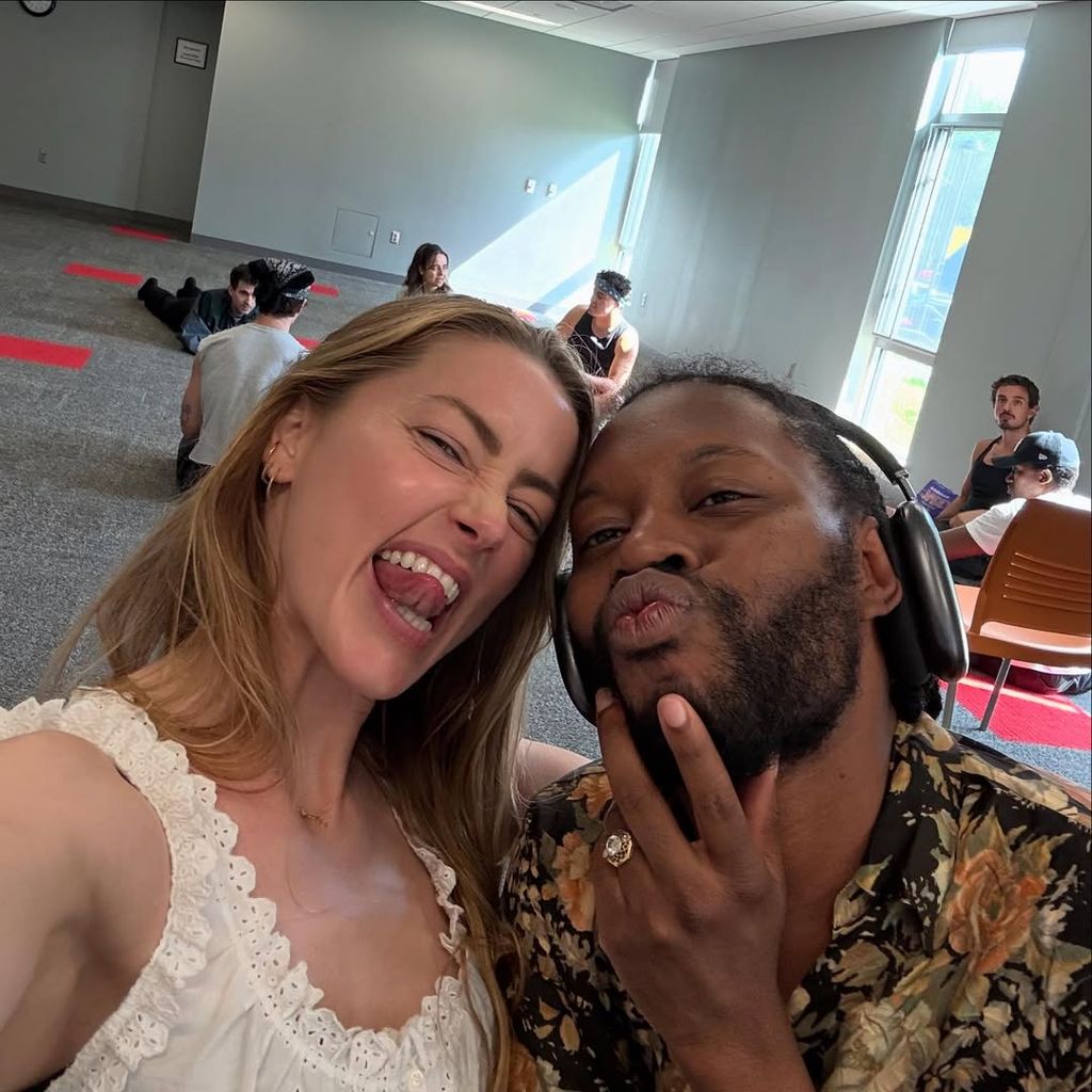 photo of amber heard pulling a funny face alongside playwright jeremy o harris