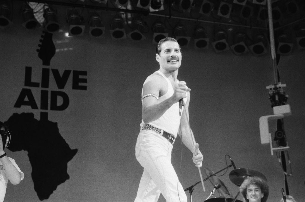 Freddie Mercury led Queen as they performed Bohemian Rhapsody, Radio Ga Ga, Hammer to Fall, Crazy Little Thing Called Love, We Will Rock You and We Are the Champions