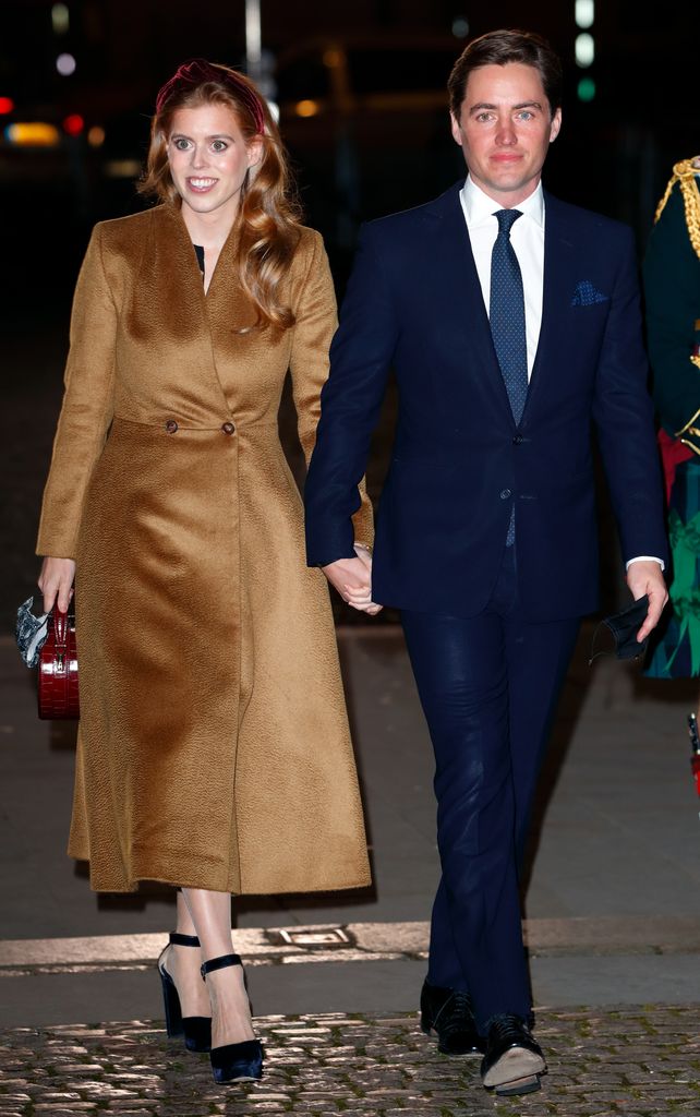 Princess Beatrice and Edoardo Mapelli Mozzi attend the 'Together at Christmas' community carol service at Westminster Abbey on December 8, 2021 in London, England. 