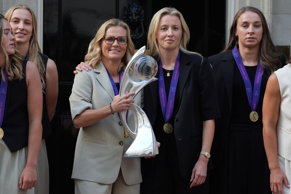 England head coach Sarina Wiegman and captain Leah Williamson posed with their trophy