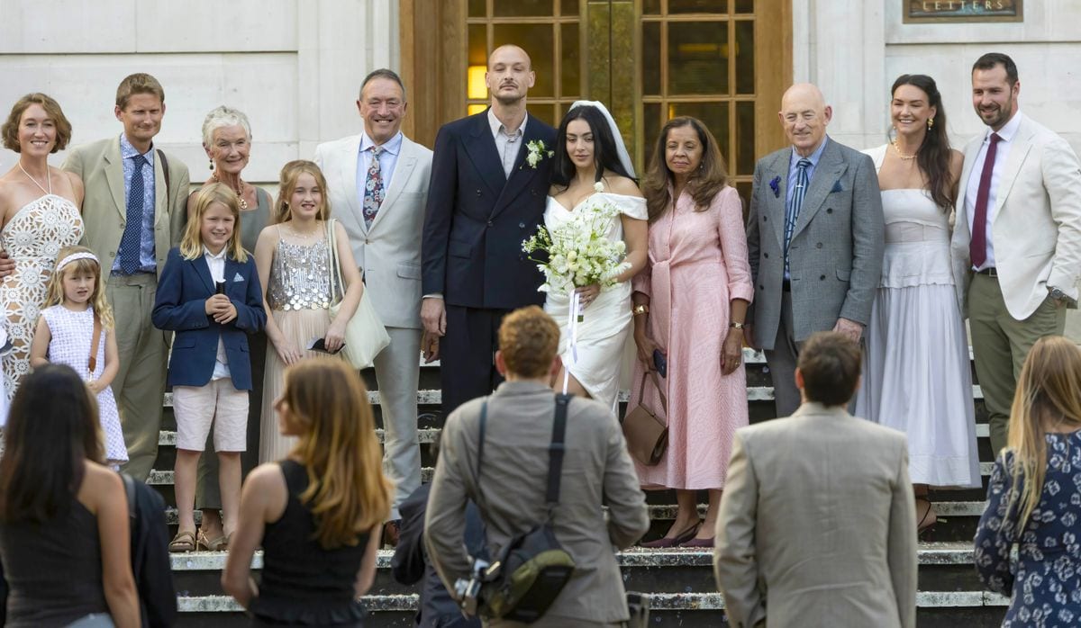 Charli XCX and new husband George Daniel celebrated with 20 of their close pals and family.