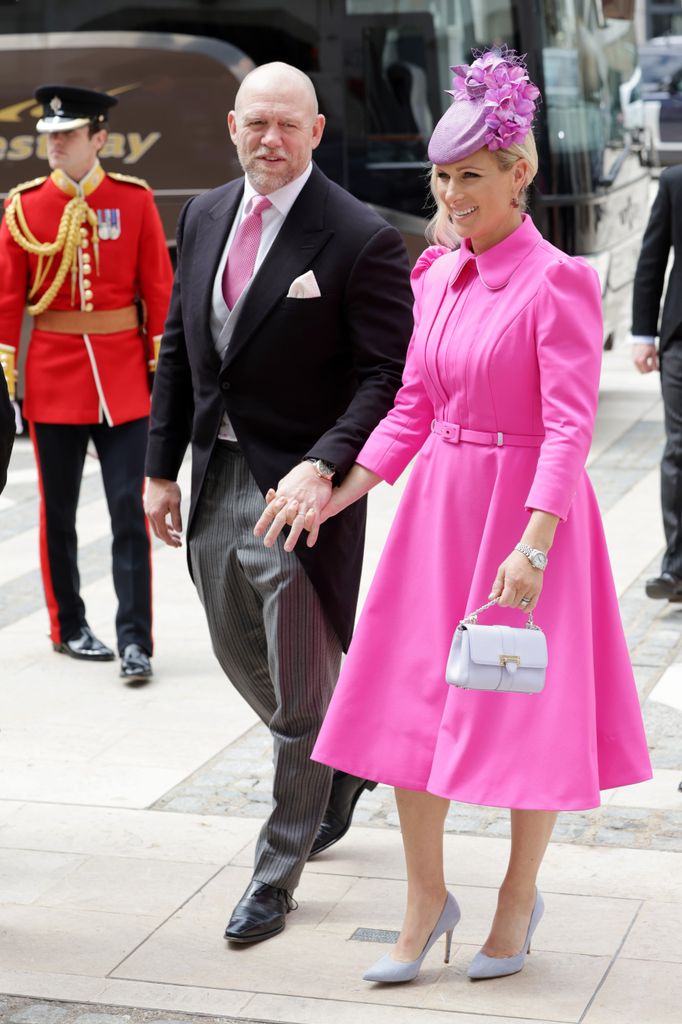 Mike Tindall in suit  and Zara Tindall in pink dress