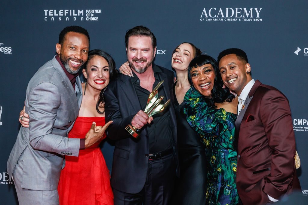 K.C. Collins, Nicola Correia-Damude, Aden Young, Kathleen Munroe, Karen Robinson, and Araya Mengesha pose with the Canadian Screen Award for Best Drama Series for "Law & Order Toronto: Criminal Intent" at the 2025 Canadian Screen Awards Gala at CBC Broadcast Centre on June 01, 2025 in Toronto, Ontario.