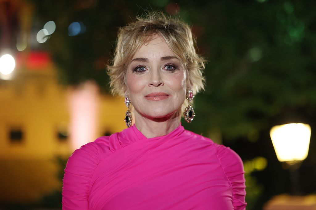 Sharon Stone posing outside 