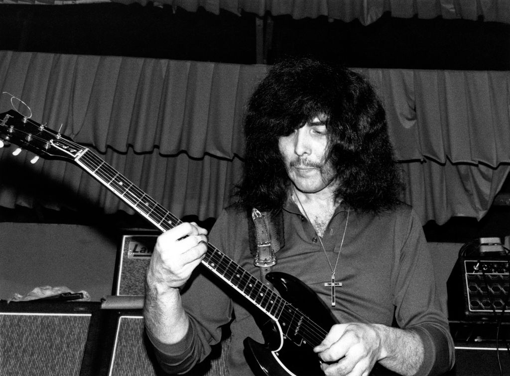 STAR CLUB  Photo of BLACK SABBATH and Tony IOMMI, Tony Iommi performing on stage as 'Earth'
