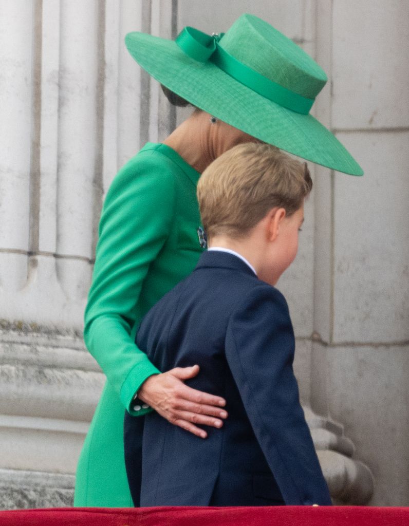 The Princess of Wales with arm around George