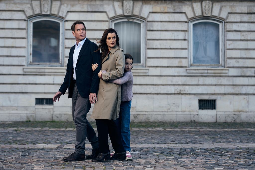 L-R Michael Weatherly as Tony Dinozzo, Cote de Pablo as Ziva David  and Isla Gie as Tali In NCIS: Tony & Ziva