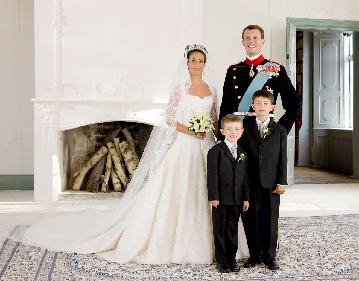 Prince Joachim of Denmark, Queen Margrethe's youngest son, and his bride, French Marie Cavallier, now Princesss Marie of Denmark, pose on this official photo on May 24, 2008 with Prince Joachim's sons, Prince Felix (L) and Prince Nikolai, at the couple's residence Schackenborg in Sonderjutland.    AFP    PHOTO    Steen Brogaard/SCANPIX  DENMARK  **DENMARK OUT** (Photo by Steen Brogaard / SCANPIX DENMARK / AFP) (Photo by STEEN BROGAARD/SCANPIX DENMARK/AFP via Getty Images)