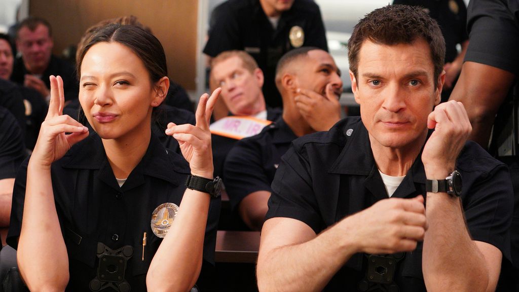Melissa O'Neil and Nathan Fillion filming The Rookie