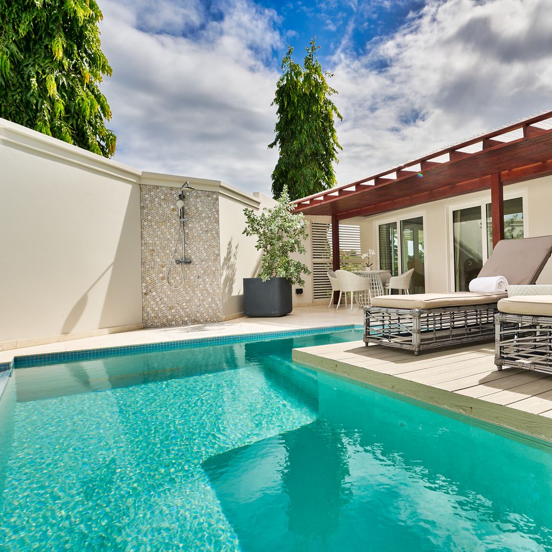 private pool with two sun loungers at villa in Grenada