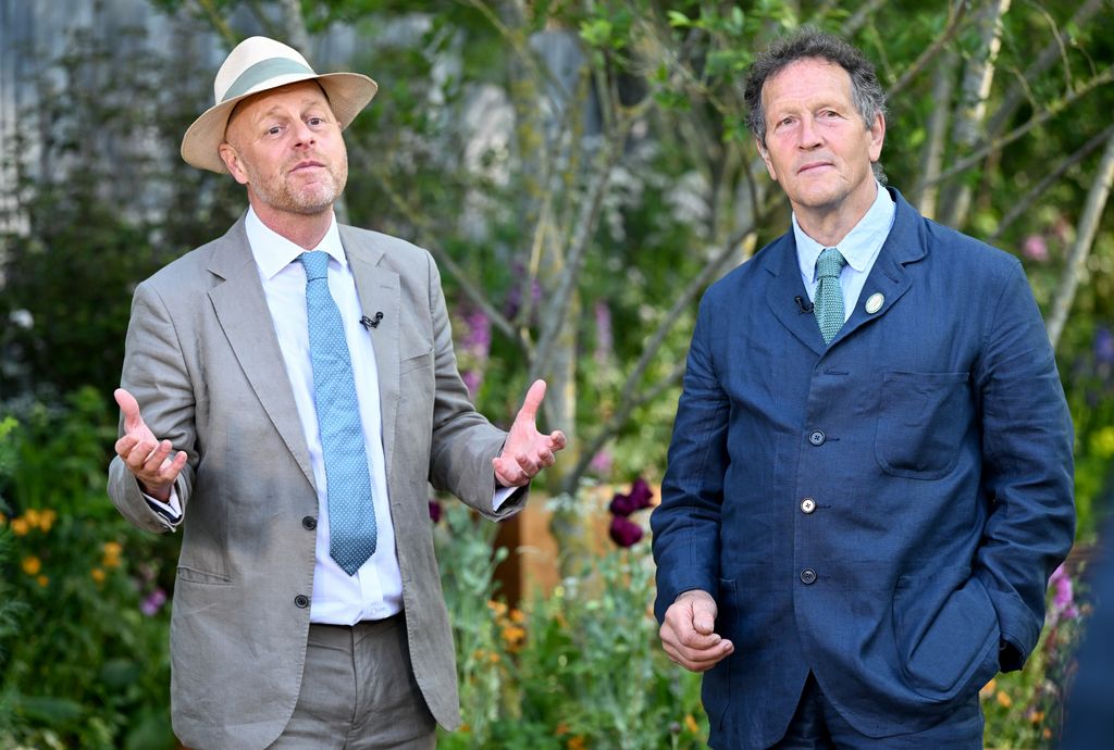 Joe Swift and Monty Don  talk in linen suits