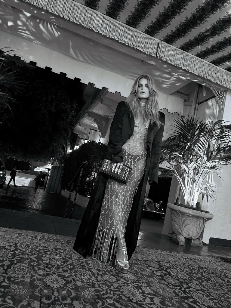 jessica simpson in see through dress with black jacket over top