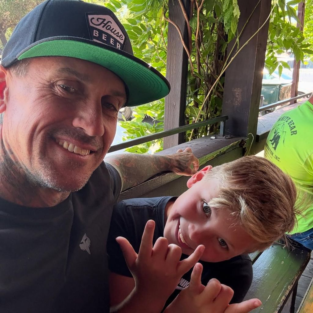 Carey Hart and Jameson pose for a selfie taken at a restaurant patio, shared on Instagram