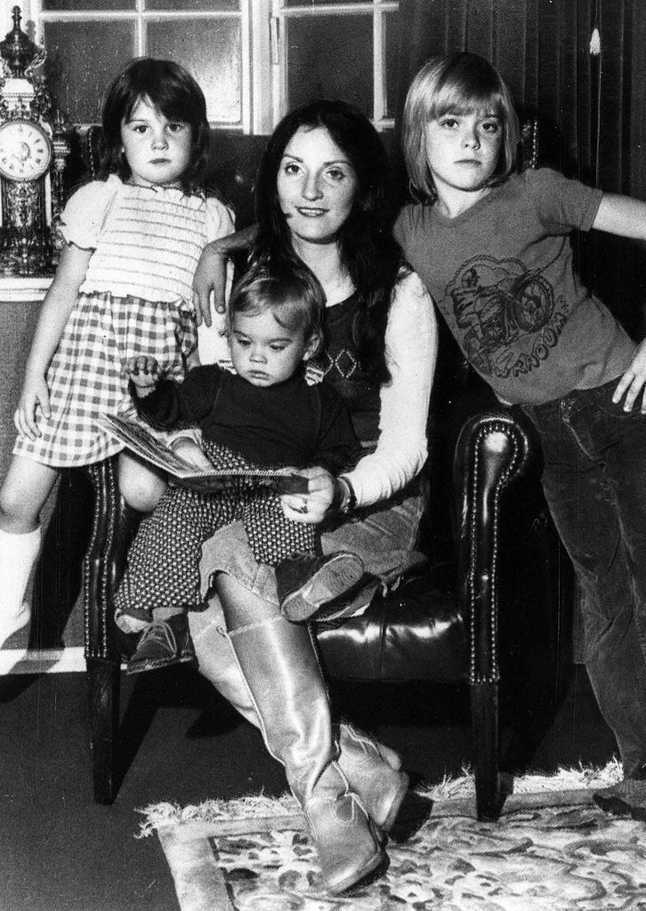 Thelma Riley with three children