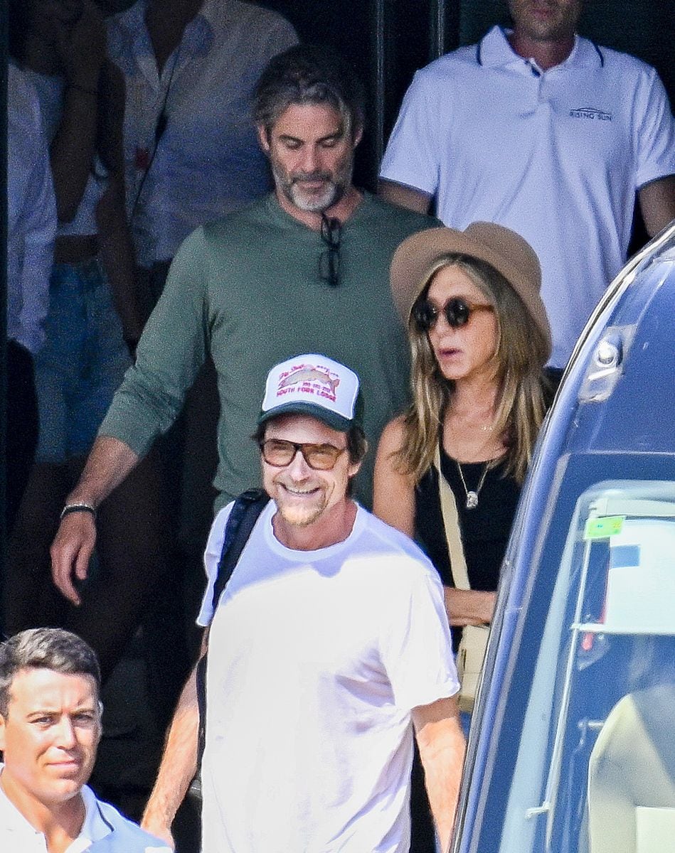 Jennifer Aniston was spotted in Palma de Mallorca with Jim Curtis, the life coach she traveled with, adding fuel to romance rumours.