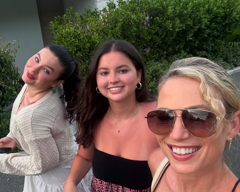 Photo shared by Amy Robach on Instagram July 2025 featuring her daughters Ava and Annalise on vacation in Turks and Caicos
