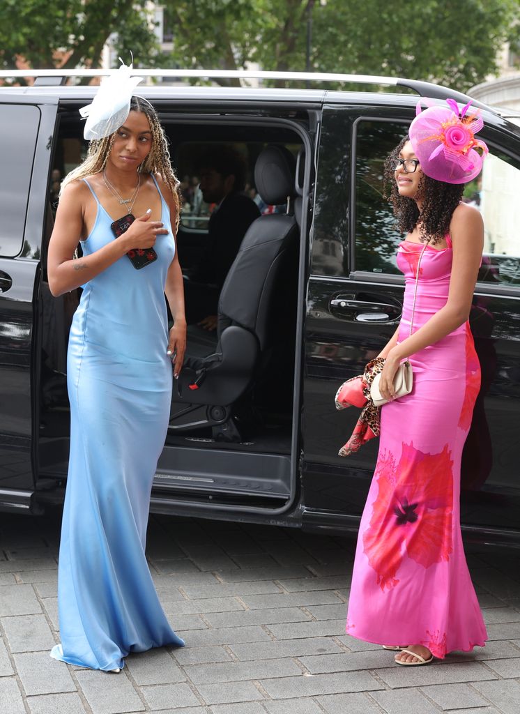 Phoenix Gulzar in blue dress and  Madison in pink dress and fascinator