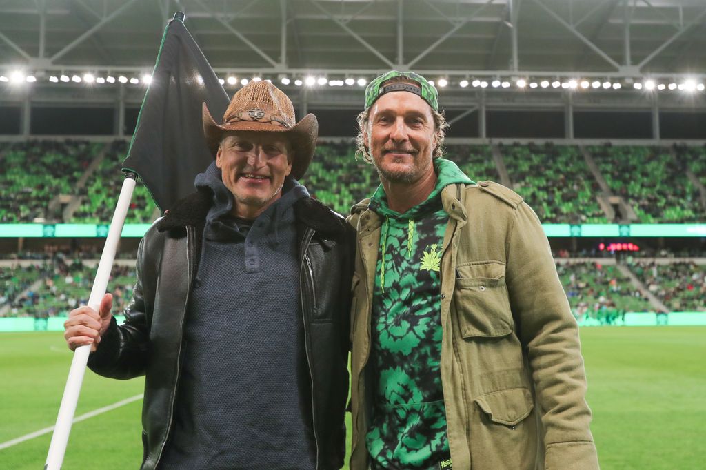 Woody Harrelson and Matthew McConaughey pose for picture during the MLS match between Austin FC and Colorado Rapids at Q2 Stadium on March 8, 2025 in Austin, Texas