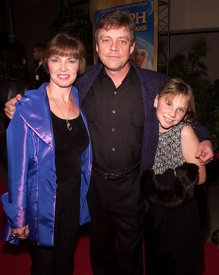 Chelsea when she was young with her parents